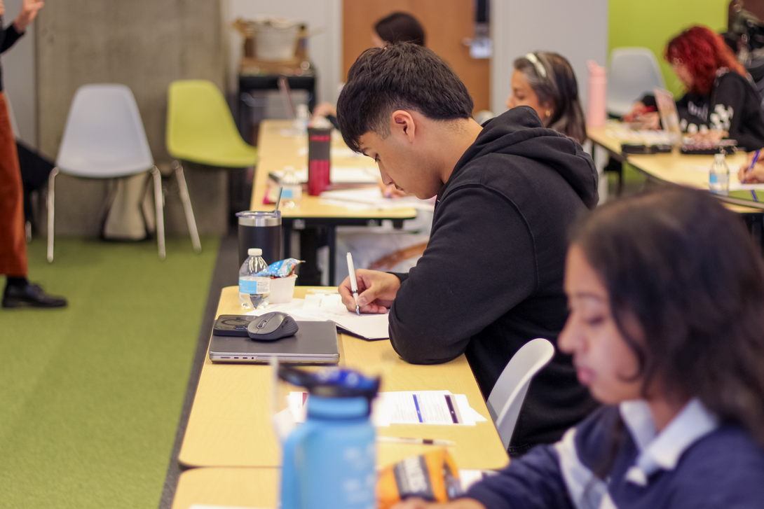 Students working in a classroom. 