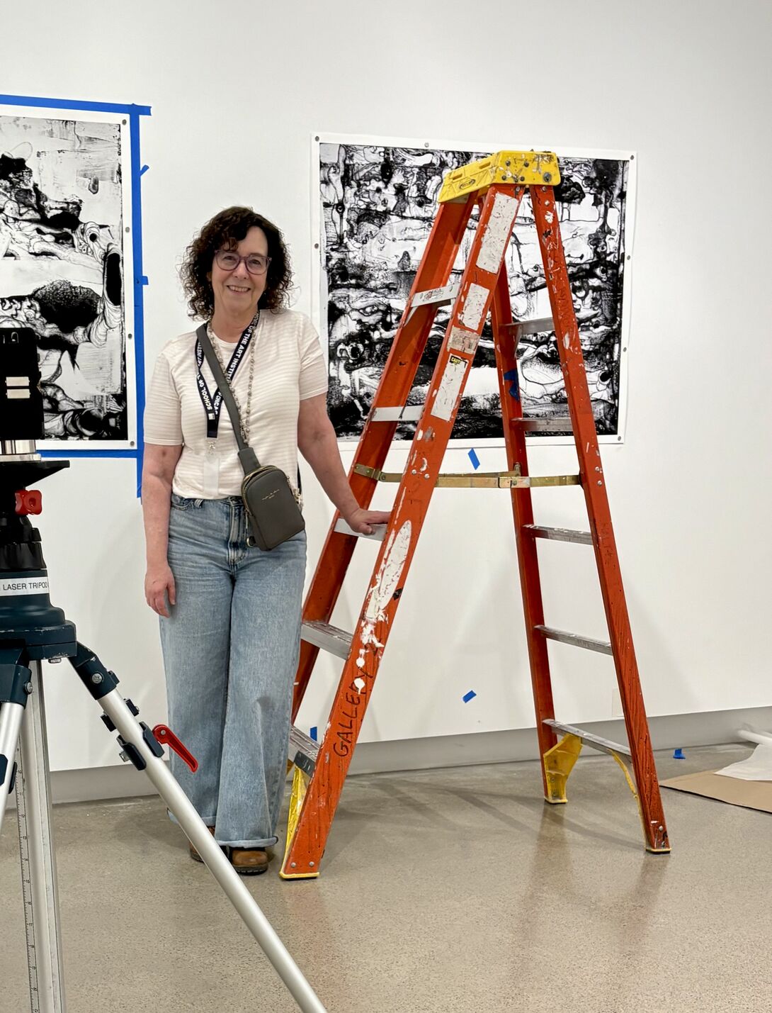 Lisa Croner installing her thesis work at the SAIC Galleries. 