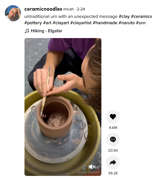A screenshot of a TikTok video showing someone carve lines into clay