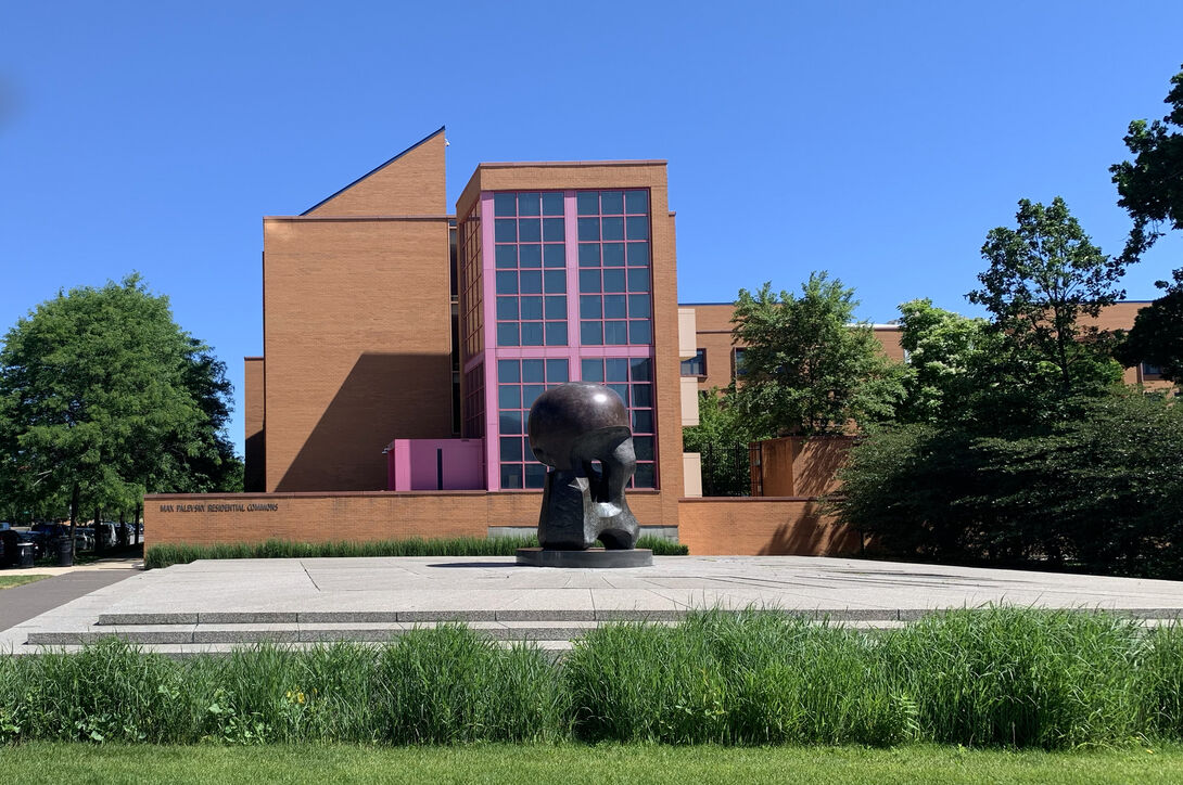 Nuclear Energy Sculpture with Library in Background